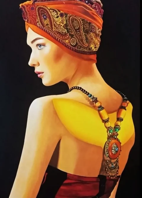 Stylised side portrait of a woman wearing warm patterned fabric
